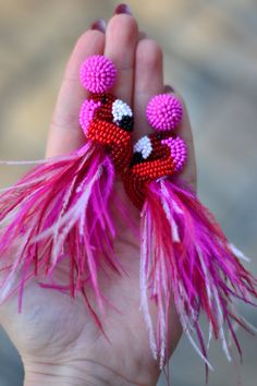 "Flamingo earrings Hot pink red beaded bird jewelry statement drop dangle feather beadwork ♡I promise that you will always be in the spotlight with such earrings!♡ Size: length -about 11 cm ( 4.5 inches) ❤ CUSTOM ORDERS It is ABSOLUTELY HANDMADE . So if you like this item in a different color or size, send me a message please. I will send you a link for a \"custom order\" and you'll be able to place the order there. Please feel free to communicate with me. SHIPPING Item will be shipped carefully Beaded Bird, Flamingo Earrings, Bird Jewelry, Jewelry Statement, Red Bead, Pink Red, Bead Work, Custom Orders, Flamingo