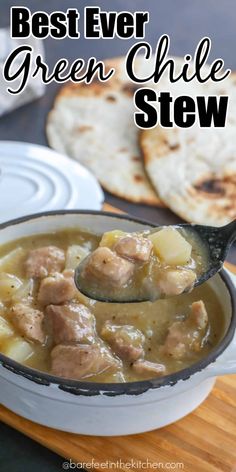 the best ever green chile stew in a white bowl with a ladle full of soup