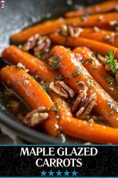 a close up of carrots in a pan with nuts on the side and text maple glazed carrots