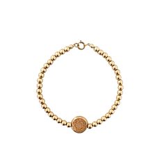 Beautiful and modern gold bead bracelet with a Saint Christopher charm. Carry around this symbol of protection for safe travels wherever you roam. Stack it with the Callan for an effortless, everyday look. All components are 14K gold filled, except for wire.  MATERIALS 14K Gold Filled If you love the look of gold, but don't want to spend as much as you would for solid gold pieces without losing out on quality, then gold filled is a great option for you. It is the second-best option after solid gold for high quality jewelry at a more affordable price. It is also far better than gold plated because a much thicker layer of gold is used, making it stronger and longer lasting. Gold Symbolic Bracelets For Everyday, Everyday Symbolic Gold Bracelets, Everyday Yellow Gold Bracelet With 8mm Beads, Spiritual Yellow Gold Beaded Jubilee Bracelets, Spiritual Yellow Gold Beaded Jubilee Bracelet, Gold Spiritual Charm Bracelet For Everyday, Everyday Spiritual Bracelets With Gold Beads, Spiritual Beaded Yellow Gold Bracelets, Yellow Gold Bracelets With 8mm Beads For Everyday