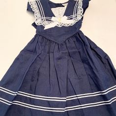 Navy Sailor Dress With Lace Trim Nwot Vintage Dresses For School In Spring, Navy School Dress For Spring, Navy Short Sleeve School Dress, Cute Navy School Dress, Cute Blue Dress For School, Casual Navy Dress For School, Cute Blue School Dress, Cute Navy Dress For Dress-up Occasions, Blue Spring Dress For School