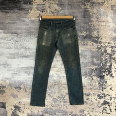 Vintage Levis 511 Denim Skinny Levis Jeans Pants - BS46535.  Manual Measurement (laying in flat area):  1) Waist: 30 inch.  2) Rise: 9 inch.  3) Hips: 18.5 inch.  4) Tight: 10 inch.  5) Outseam: 38.5 inch.  6) Inseam: 30 inch.  7) Leg opening: 6.5 inch.  Fabric Material: 100% Denim Cotton.  Condition: In good vintage condition overall.  Please check all the measurement to insyre a proper fit.  Remember to allow yourself some extra room for movement.  You can compare these information with your f Dark Wash Distressed Straight Bottoms, Green Denim Jeans With Five Pockets, Fitted Faded Pants With Five Pockets, Faded Fitted Pants, Green Fitted Denim Jeans, Fitted Green Denim Jeans, Mid-rise Green Denim Jeans, Green Mid-rise Denim Jeans, Green Distressed Denim Bottoms