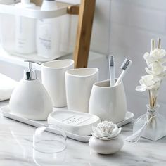 Give your bathroom the spa retreat feeling with this chic bathroom set. DESIGN – Luxurious style, sleek and smooth finish. FEATURES – Available in sets of 4 or 5 pieces; gold, silver or white. MATERIAL – Ceramic + Plastic. Porcelain Decor, Electric Toothbrush Holder, Melamine Tray, Bathroom Accessory Sets, Bath Accessories Set, Hotel Bathroom, Chic Bathrooms, Bathroom Accessory Set, Soap Boxes