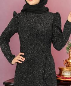 The fabric of the dress is 95 percent polyester and 5 percent elastin.  It is a lined dress.  The measurements of the dress in the picture are size 38, chest 92 cm, waist 72 cm, hips 96 cm.  Dress length is 160 cm.