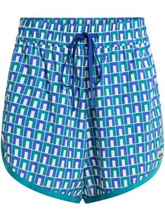 light blue/multicolour jersey texture geometric-pattern print embroidered logo at the leg high-waisted elasticated drawstring waistband straight leg thigh-length Sporty Printed Short Bottoms, Printed Sports Shorts, Sporty Printed Shorts, Casual Bottoms With Geometric Pattern For Summer, Casual Summer Bottoms With Geometric Pattern, Multicolor Bottoms With Geometric Pattern For Summer, Lacoste Logo, Versace Outfit, City Dress