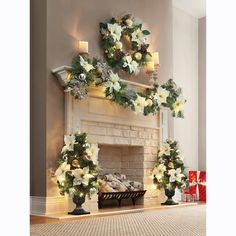 a fireplace decorated for christmas with flowers and greenery