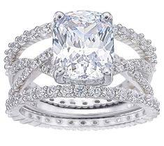 an engagement ring set with a cushion cut diamond