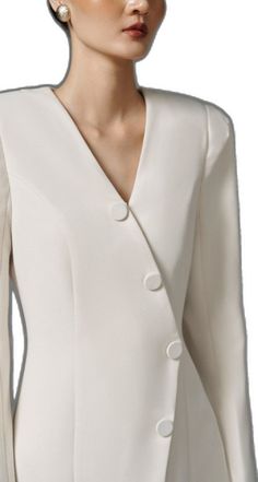 Modern Fitted Long Sleeve Blazer Dress, Modern Long Sleeve Blazer Dress For Formal Occasions, Elegant V-neck Dress With Hidden Buttons, Classic V-neck Blazer Dress For Evening, Formal Dresses With Side Buttons, Elegant V-neck Blazer Dress With Hidden Buttons, Elegant Formal Blazer Dress With Covered Buttons, Elegant Spring Blazer Dress For Tailoring, Elegant Evening Dresses With Side Buttons