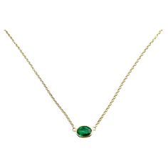 The bezel solitaire necklace combines vintage-inspired detail and modern appeal together for a look that’s timelessly elegant, simple, and classy. Each 14k solid gold bezel setting is hand-wrapped. We've built the necklace for versatility as the length of the chain can be adjusted to 14, 16, or 18 inches to suit individual preference. Emeralds represent the birth month of May. This gemstone is natural and is certified. This is 14k Solid Gold. (We do not sell filled or plated jewelry) Perfect for Luxury Green Necklace With Oval Cabochon, Elegant Formal Necklace With Smooth Bezel, Timeless Oval Necklace With Single Diamond, Timeless Oval Solitaire Necklace For Formal Occasions, Classic Oval Solitaire Necklace, Elegant Smooth Bezel Necklace For Formal Occasions, Classic Emerald Necklace As Birthstone In Yellow Gold, Classic Emerald Necklace With Bezel Setting, Classic Solitaire Necklace With Smooth Bezel For Formal Occasions