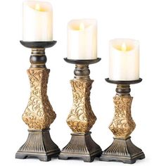 three candles sitting on top of each other