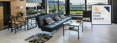 a living room filled with furniture and lots of windows