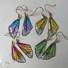 Pretty Little Iridescent Butterfly Wing Earrings. 4 Colors To Choose From. Each On A Gold Nickle Free Surgical Steel French Hook. Iridescent Butterfly, Resin Butterfly, White Hoop Earrings, Engraved Earrings, Bottle Earrings, Horse Earrings, Vintage Clip Earrings, Butterfly Wing Earrings, Ethiopian Opal Ring