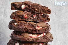 a stack of chocolate cookies with candy canes