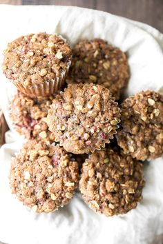 muffins with cranberries and oatmeal are on a plate