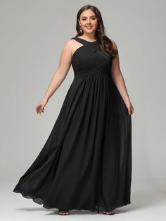 a woman in a long black dress