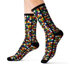 "These fun Rubik's Cube socks are high quality socks with a smooth finish and a special flair that only a Rubik's Cube Sock design can provide! It was one of our original designs and is still a best-seller! .: 60% Polyester 10% Acrylic 25% Nylon 5% Spandex .: 3 different sizes .: Ribbed tube .: Cushioned bottoms SIZE CHARTSML Men's US size5 - 6.57 - 9.510 - 13 Women's US size6 - 88.5 - 1111.5 - 13 Total Length, in1315.3616.15 Width, in3.943.943.94 ABOUT THE COOL CUBE MERCH SHOP - https://www.ets Multicolor Non-slip Comfortable Socks, Comfortable Non-slip Multicolor Socks, Comfortable Multicolor Non-slip Socks, Cube Solver, Cube World, Cool Cube, Sock Design, Rubix Cube, Cube Pattern