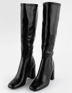 Madden Girl Winslow Tall Stretch Boots. Crafted From High-Quality Faux Leather, These Boots Offer A Sleek And Sophisticated Look That Pairs Effortlessly With Any Outfit. The Tall Silhouette Elongates The Legs, While The Stretchy Material Ensures A Snug And Comfortable Fit. With A Convenient Side Zipper, These Boots Are Easy To Slip On And Off. The Chunky Block Heel Provides Stability And Support, Allowing You To Strut With Confidence All Day Long. Square-Toe. 3-1/2" Block Heel. Shaft Height: 14-3/8"; Circumference: 13-1/2" All Manmade Materials. Imported. Faux Leather Over The Knee Boots, Women’s Tall Boots, Skin Tight Boots, Different Types Of Boots, Knee High Boots Heels, Fall Thrift, Black Tall Boots, Long Black Boots, Tall Black Boots