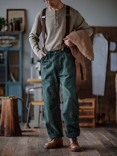 This is a classic straight-leg, mid-rise work pant with vintage buttons at the waist to match your American Western style backpack. It has been washed to give a slightly nostalgic look. The slightly relaxed fit is inspired by the '90s, and it's made from 100% cotton heavy twill fabric in your choice of two core colorways. FEATURES 100% cotton Heavy twill fabric Relaxed fit Zip fly Slant pockets Stone washed Style Number:099 SIZING & FIT Please carefully read the size info before purchase! Differ Farmer Style Men, Mens Goblincore, Farm Outfit Men, Cottage Core Mens Fashion, Suspenders Men Casual, Pagan Outfits, Rugged Gentleman Style, Cottagecore Men, Farmer Clothes