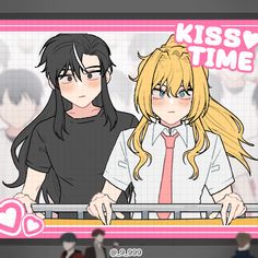 two people standing next to each other in front of a screen with the words kiss time on it