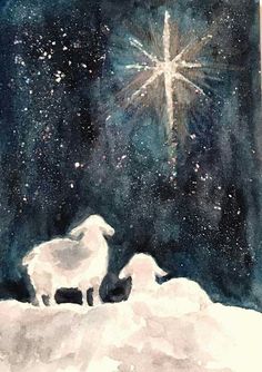 two sheep are standing in the snow with a star above them