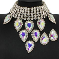 Shiny crystal statement necklace. Adjustable. Choker statement style. Allow 2-5 business days for delivery Iridescent Jeweled Jewelry For Parties, Iridescent Crystal Necklaces For Party, Iridescent Crystal Jewelry With Rhinestones, Party Jeweled Crystal Bib Necklaces, Crystal Statement Necklace, Oil Spill, Fashion Statement, Choker, Choker Necklace