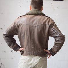 "Warm vintage aviator jacket. It has seven pockets in total and, super warm extended collar and strong zipper closure. Gently distressed and will serve a life-time. Size: label says M, seems like men's (M) and women's (L) PLEASE CHECK ALL MEASUREMENTS BELLOW: Length: 65 cm/ 26\" Shoulder to shoulder: 51 cm/ 20\" Sleeve: 60 cm/ 24\" Chest: 120 cm/ 47\" Condition: very good Fabric: leather, cotton Brand: Gatto * dry clean only Model's height: 181 cm/ 5'9'' Find other great jackets here: https://ww Rugged Leather Jacket With Pockets For Winter, Rugged Brown Leather Jacket For Winter, Brown Moto Leather Jacket With Pockets, Vintage Brown Biker Jacket For Winter, Rugged Distressed Brown Biker Jacket For Winter, Brown Moto Outerwear With Pockets, Retro Winter Biker Jacket For Outdoor, Retro Winter Biker Jacket, Vintage Brown Long Sleeve Biker Jacket For Winter