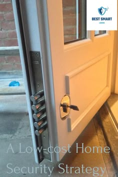 an open door with a key in it and a lock on the side of the door