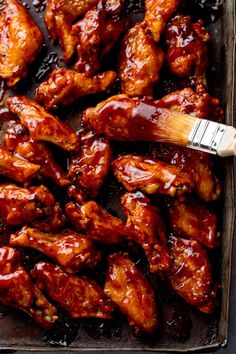 chicken wings with bbq sauce in a baking pan