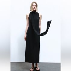 Round Neck Midi Dress With Multi-Positional Tie Detail And One Long Sleeve. Dark Anthracite, Brand New With Tags. Strechy: S: Armpit To Armpit 15” And Beyond, Length 52” L: Armpit To Armpit 17” And Beyond, Length 52” Elegant Black Sleeveless Long Dress, Elegant Black Long Sleeveless Dress, Chic Black Sleeveless Long Dress, Chic Black Long Sleeveless Dress, Elegant Black Maxi Dress For Spring, Elegant Zara Sleeveless Cocktail Dress, Chic Black Sleeveless Evening Dress, Black Sleeveless Evening Dress By Zara, Zara Sleeveless Evening Dress For Spring