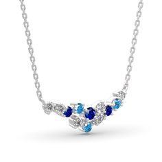 Dazzling with colour, this fashion necklace is certain to receive instant compliments. Created in sterling silver, this intriguing style showcases an array of stones - light blue, midnight blue and white stones - all placed along a curved bar design. Add this masterpiece to your jewelry box and you won't be disappointed.Carat Weight: 3.07 ctStone Size: 3,3.5,3 mmStone Type: Jeulia® StoneNumber of Stones: 12 Stone Shape: RoundStone Color: Diamond White, Aquamarine Blue, Sapphire BlueWeight: 2.1 g Blue Stones Fine Jewelry, Fine Jewelry With Blue Stones, Blue Fine Jewelry With Stones, Fine Blue Jewelry With Stones, Blue Pendant Birthstone Necklace For Anniversary, Blue Diamond Necklaces With Sparkling Stones, Blue Diamond Gemstone Necklace, Blue Sapphire Pendant Diamond Necklace, Blue Diamond Pendant Necklace