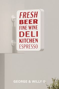 there is a sign that says fresh beer fine wine deli kitchen espresso