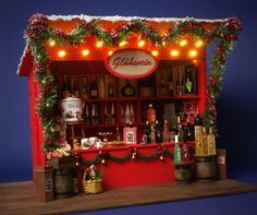 a miniature bar with christmas decorations and lights