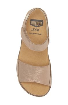 A leather-wrapped platform raises this sandal that offers total comfort with a contoured footbed that targets pressure points to relieve tension and stress. 1 3/4" heel (size 9) Adjustable hook-and-loop strap Zen footbed massages pressure points as you walk to relieve stress in the muscles and increase circulation Leather upper/textile lining/rubber and synthetic sole Made in Spain Medium Width Sandals With Leather Footbed And Round Toe, Medium Width Leather Footbed Sandals With Round Toe, Comfortable Leather Wedge Sandals With Textured Footbed, Comfortable Leather Heels With Ortholite Insole, Comfortable Leather Heels With Arch Support, Comfortable Wedge Heel Sandals With Removable Insole, Comfortable Sandals With Heel Loop And Round Toe, Leather Closed Toe Footbed Sandals With Arch Support, Synthetic Ankle Strap Footbed Sandals With Arch Support