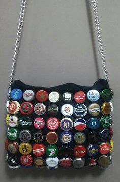 a bottle cap purse hanging on a wall