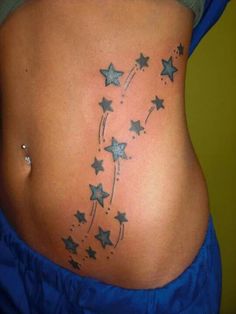 a woman's stomach with stars on it