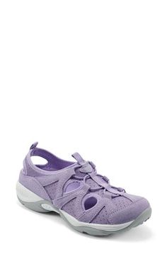 Perfect for outdoor activities, this sporty sneaker constructed with suede paneling and cutout details is fitted with a cushioned footbed and rubber sole. 1" platform Removable, cushioned insole with arch support Leather and textile upper/textile lining/rubber sole Imported Sporty Sneakers, Easy Spirit, Walking Sneakers, Arch Support, Light Purple, Womens Shoes Sneakers, Outdoor Activities, Womens Sneakers, Rubber Sole