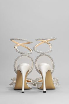 Pumps in white silk, pointed toe, bow detail, crystals detail, ankle strap, heel 105mm, 100% satin, leather sole, Made in Italy Luxury Evening Wedding Shoes With Rhinestones, Luxury Evening Wedding Shoes With Wrapped Heel, Luxury Wedding Shoes With Wrapped Heel For Evening, Mach Mach Wedding Shoes, Black Mach Mach Heels, Mach And Mach Heels Wedding, Mach And Mach Heels White, Mach And Mach Platform, Sneaker Wedge