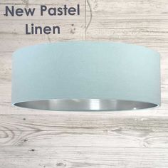 the new pastel linen lamp shade is available in various sizes and colors, including blue