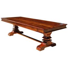 a large wooden table with two legs