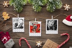 christmas decorations and photos hanging on clothes line with gingerbreads, candy canes and cookies