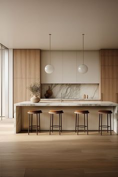 a kitchen with marble counter tops and stools next to an island in the middle