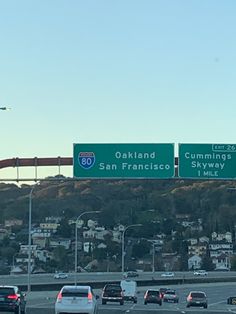 the freeway is busy with cars and trucks on it's way to san francisco