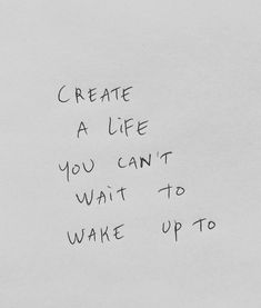 a piece of paper with writing on it that says create a life you can't wait to wake up to