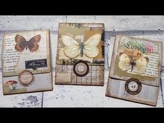 three small cards with butterflies on them