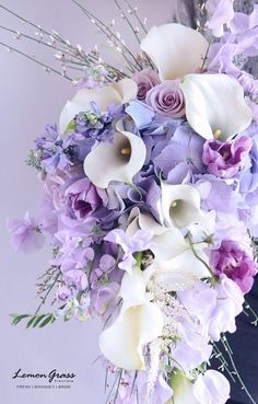 a bouquet of purple and white flowers