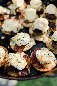 small appetizers with meat and cheese are on a grill