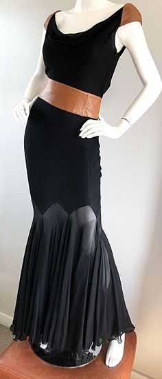 For Sale on 1stDibs - Extremely rare 1992 GIANNI VERSACE COUTURE Musuem Worthy black silk chiffon and leather full length evening dress! Features a super flattering base full Elegant Black Ballroom Dresses, Elegant Fitted Evening Dress For Ballroom, Elegant Floor-length Ballroom Evening Dress, 2001 Runway, Tan Leather Belt, Versace Couture, Kylie Minogue, Gianni Versace, Silk Chiffon