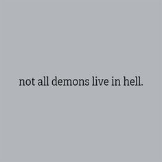 the words not all demons live in hell written on a gray background with black lettering