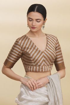 Buy Pranay Baidya Gold Tissue Striped Saree Blouse Online | Aza Fashions Turtle Neck Blouse With Saree, Plan Blouse Design, V Neck Pattern Blouse, Striped Blouse Designs For Saree, V Neck Back Blouse Design, Latest Trendy Blouse Designs For Silk Saree, Blouse Stiching Design, Stripes Blouse Designs, Tissue Blouse Designs