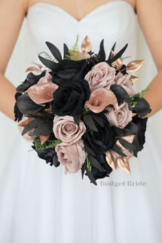 a bridal bouquet with black and pink flowers